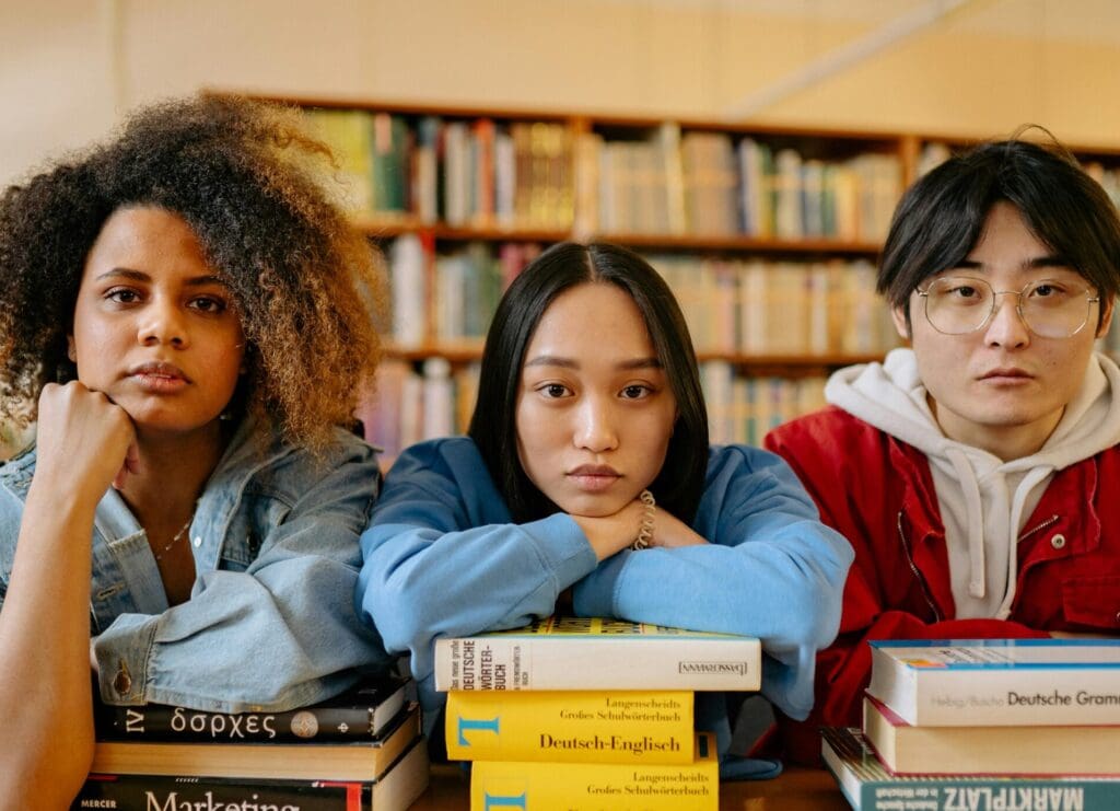 Students looking forward with books in hands